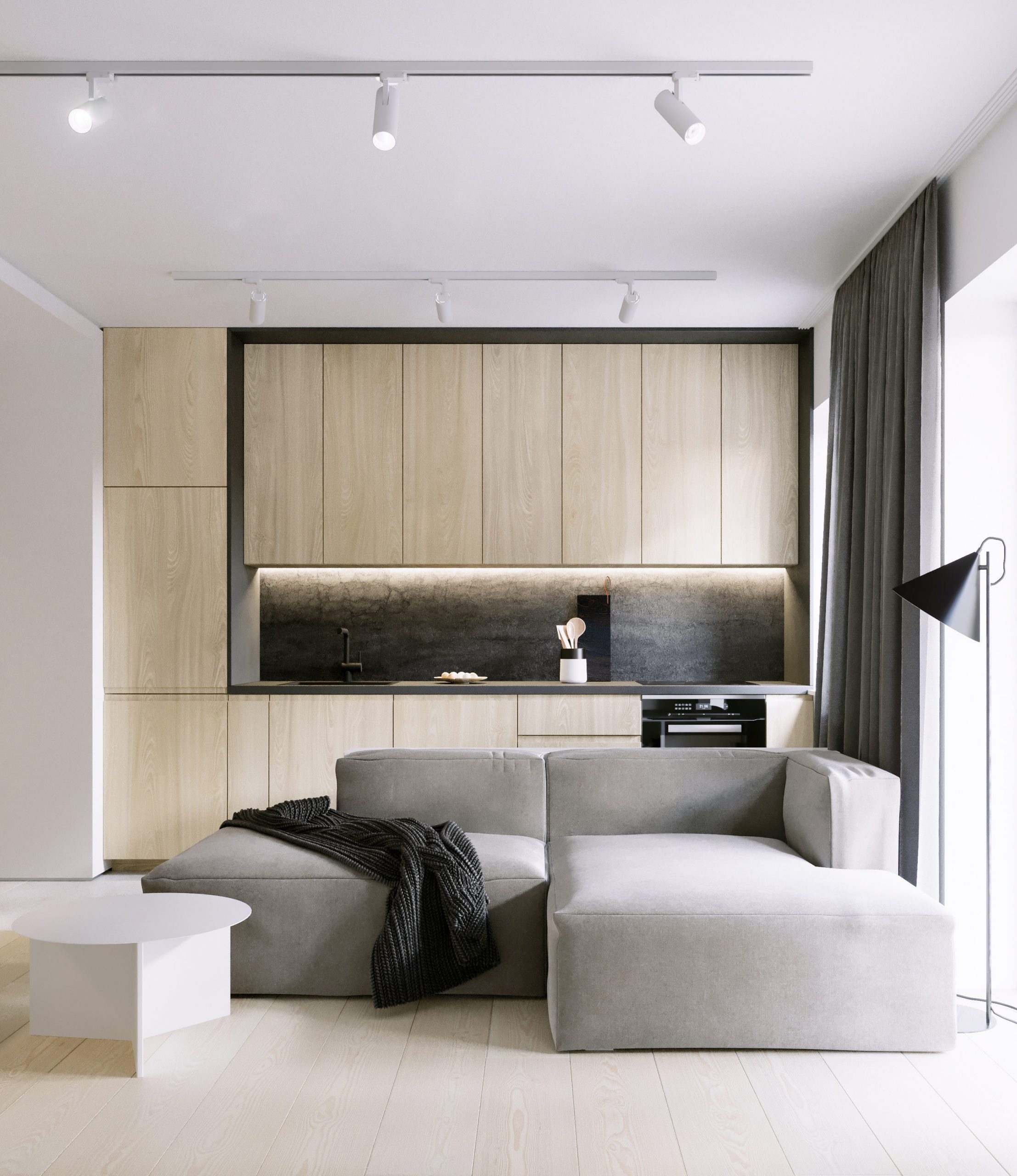 Przytulny salon z aneksem kuchennym z dużą ilością drewna oraz czarnymi akcentami, Lublin