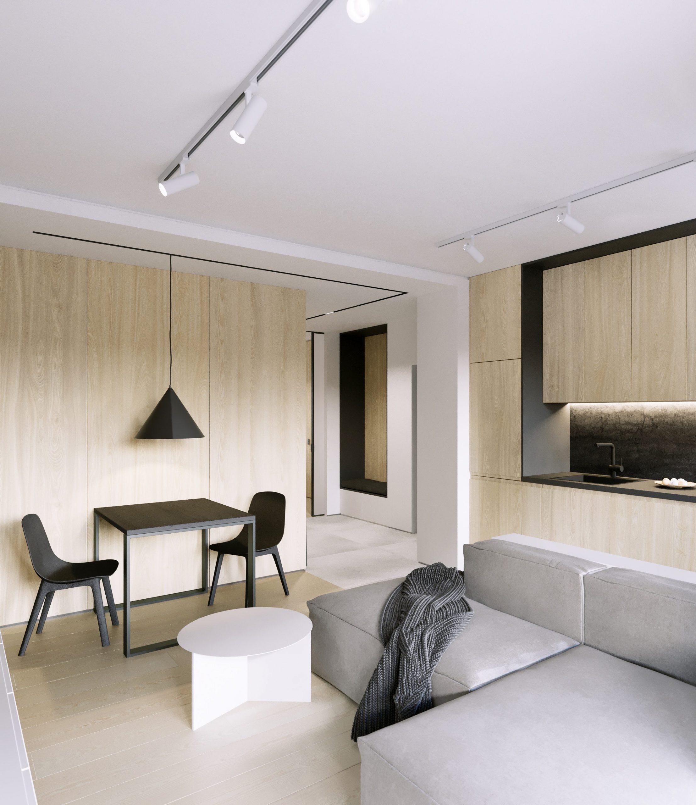 Przytulny salon z aneksem kuchennym z dużą ilością drewna oraz czarnymi akcentami, Lublin